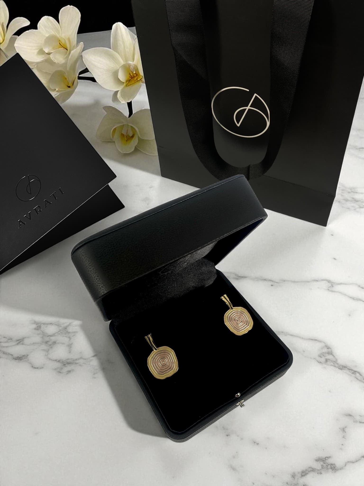 Avrati earrings in jewelry box